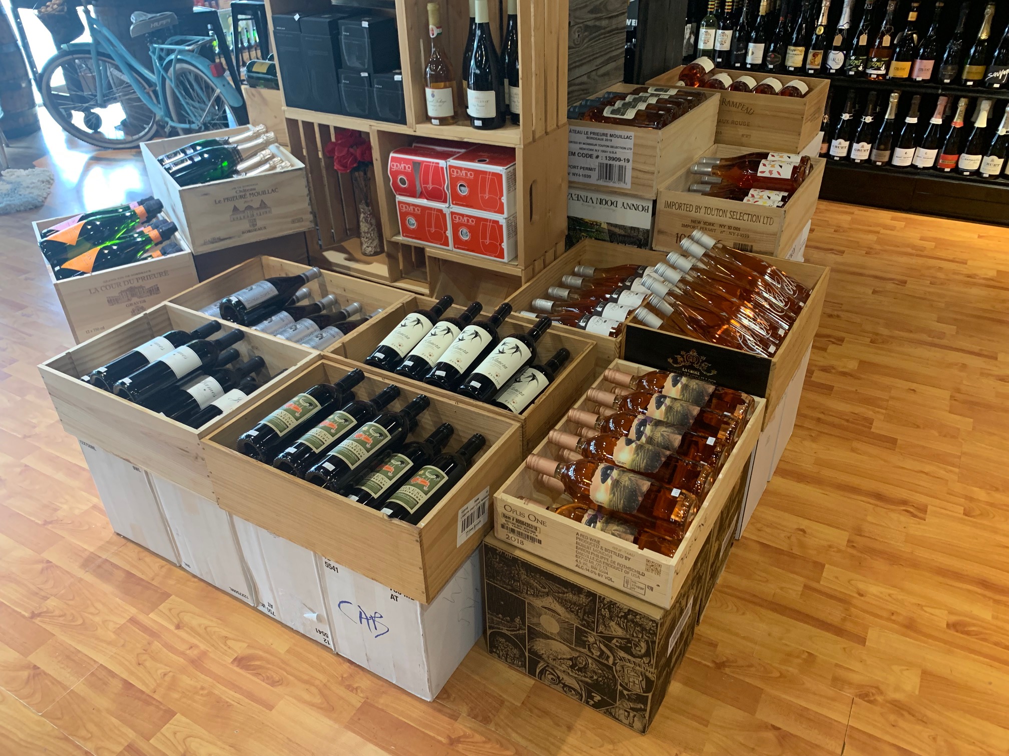 Crates of wine bottles inside a store